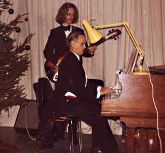 John Curtin playing the Piano